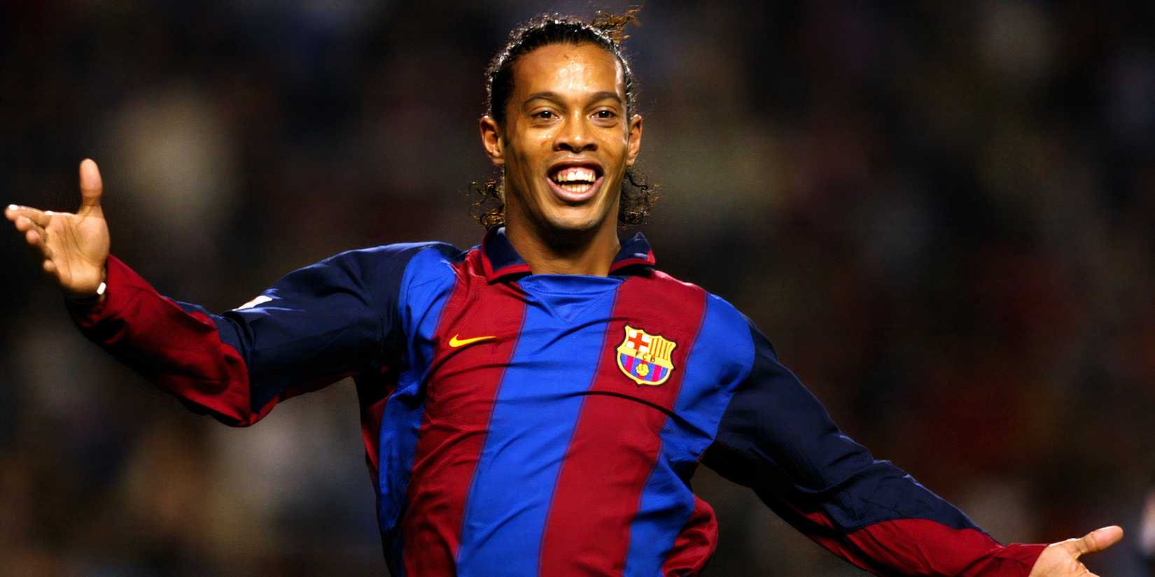 Ronaldinho celebrates a goal for Barcelona.