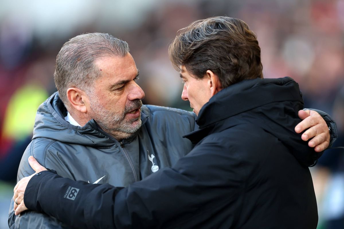 Ange Postecoglou and Thomas Frank embrace