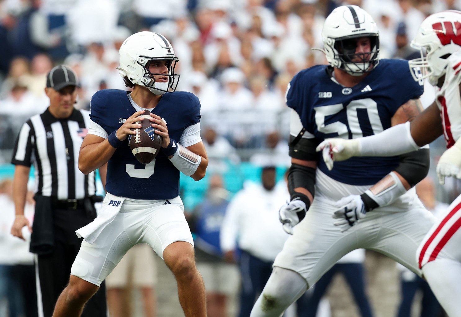 Sep 26, 2026; University Park, Pennsylvania, USA;  Penn State Nittany Lions quarterback Rocco Becht (3) looks to throw a pass during the first quarter against the Wisconsin Badgers at West Shore Home Field at Beaver Stadium.  Mandatory Credit: Matthew O'Haren-Imagn Images