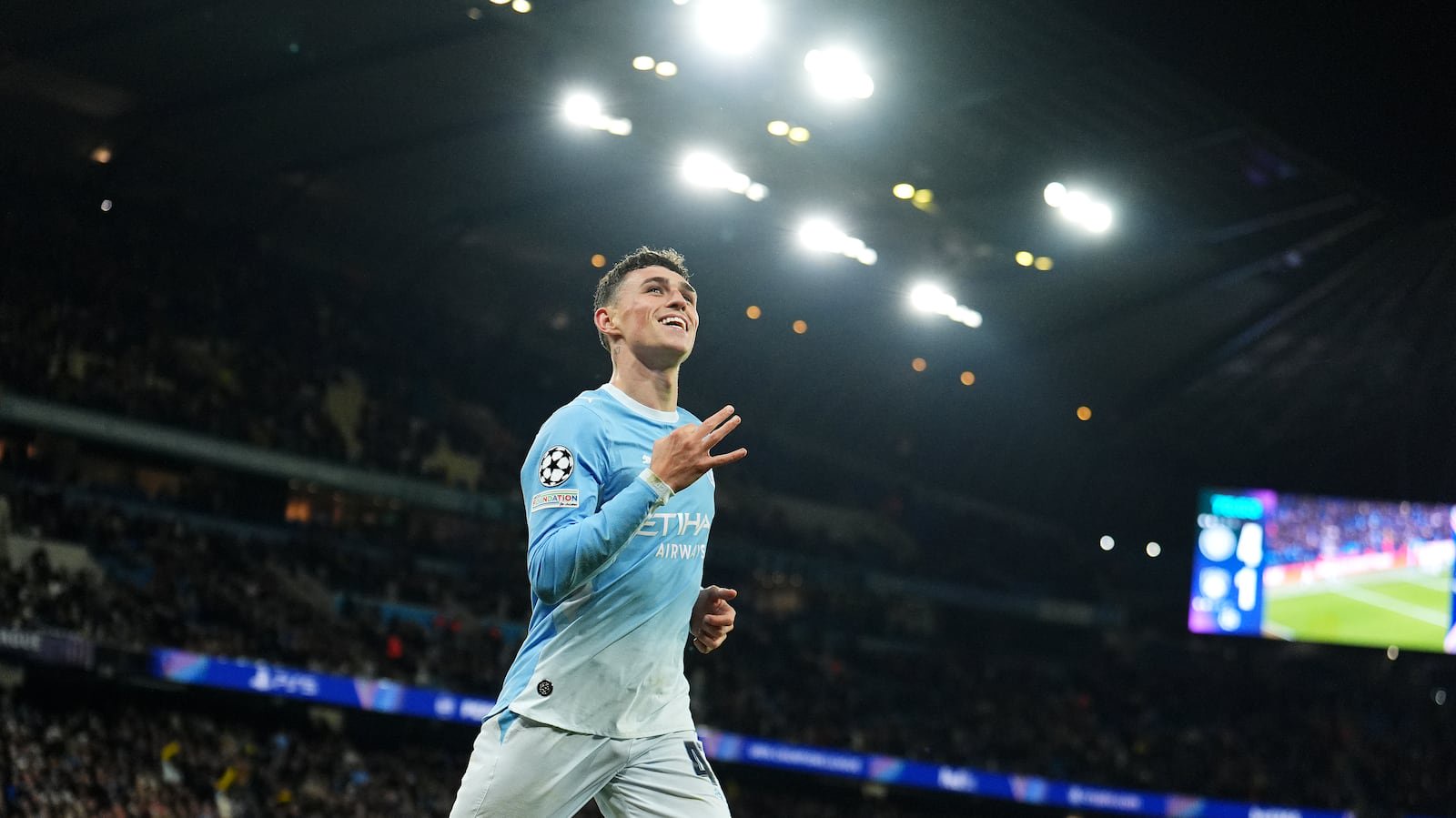 Manchester City’s Phil Foden celebrates scoring a hat-trick