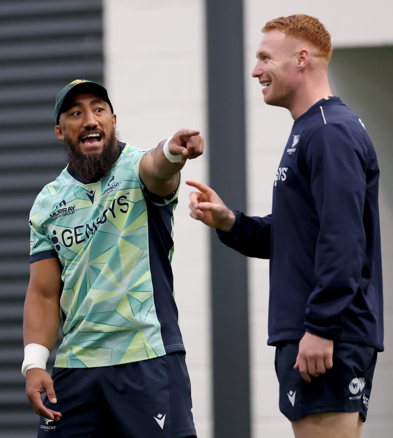 Bundee Aki and Ciaran Frawley share a joke during Connacht training. Photograph: James Crombie/Inpho