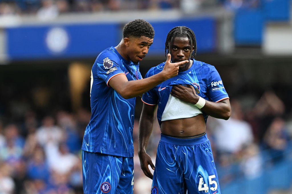 Wesley Fofana and Romeo Lavia of Chelsea speak during the Premier League match between Chelsea FC and Manchester City FC at Stamford Bridge on Augu...