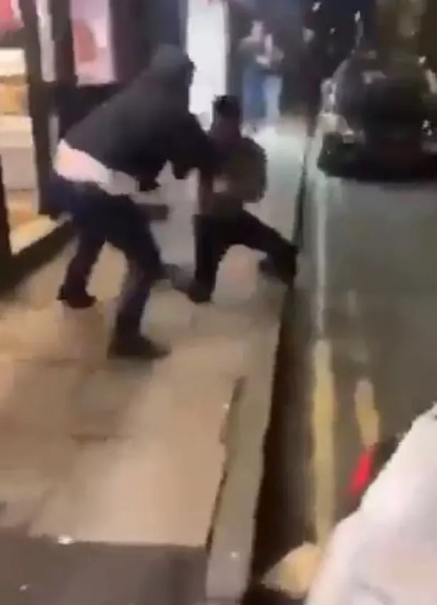 Onlookers finally stopped the brawl between the two men