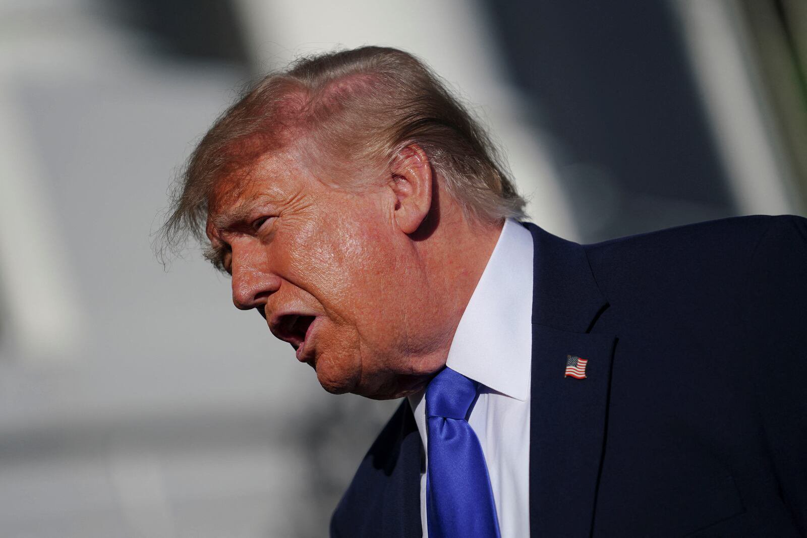 US President Donald Trump speaks to members of the media as he departs the White House en route to Iowa, in Washington, DC, US, October 22, 2026. REUTERS/Nathan Howard