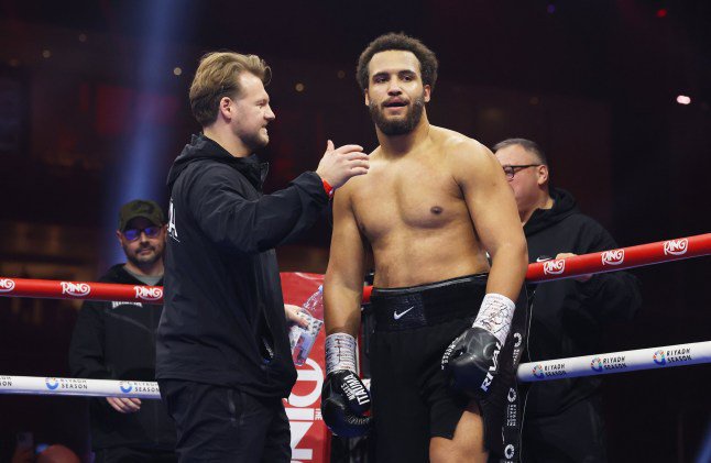 RIYADH, SAUDI ARABIA - DECEMBER 21: Moses Itauma celebrates victory with Head Trainer Ben Davison following the WBO Inter-Continental, WBA International and Commonwealth Silver Heavyweight titles' fight between Moses Itauma and Demsey McKean as part of Oleksandr Usyk v Tyson Fury 2, Reignited card at Kingdom Arena on December 21, 2024 in Riyadh, Saudi Arabia. (Photo by Richard Pelham/Getty Images)