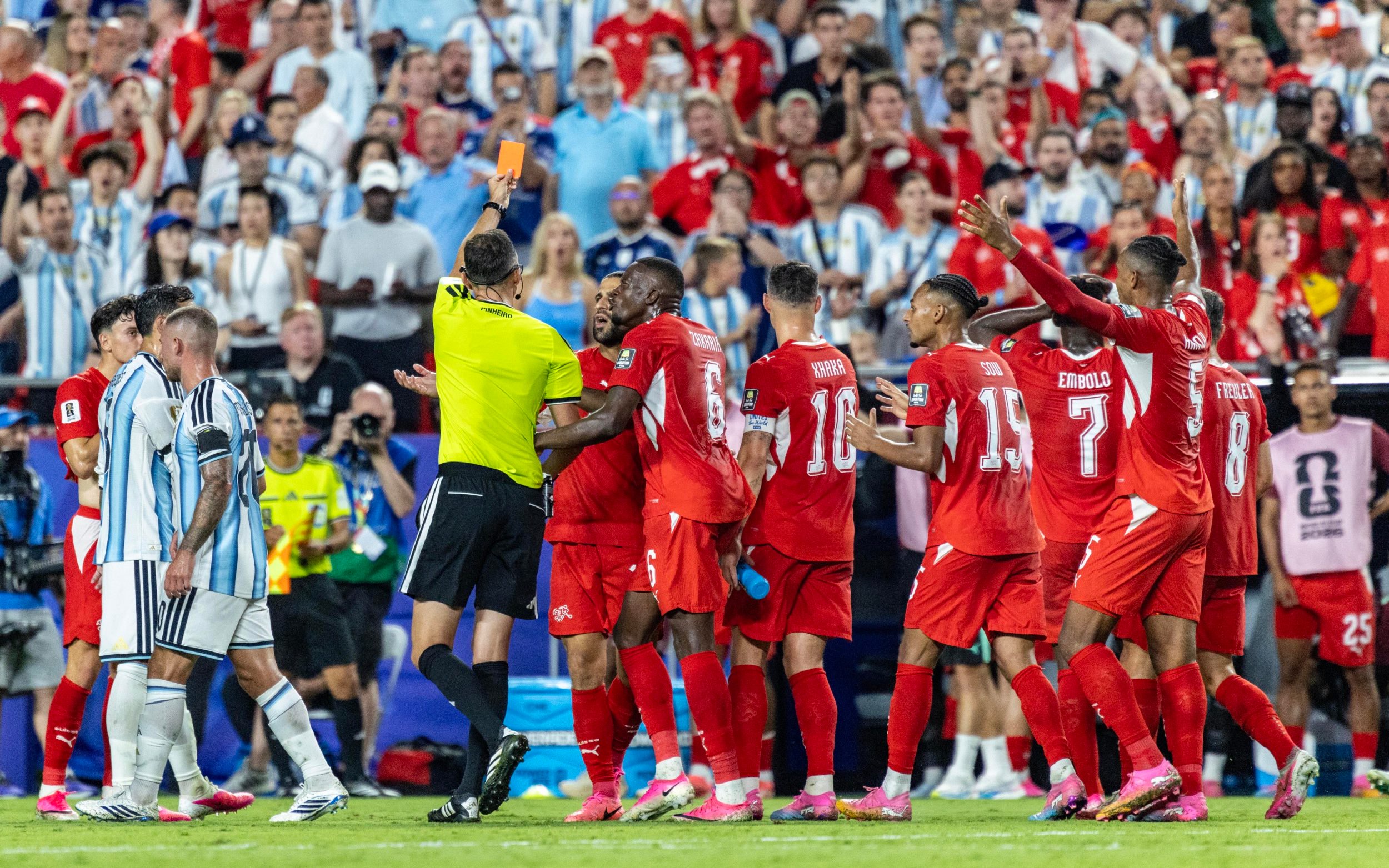 Breel Embolo of Switzerland receives a second yellow card during the FIFA World Cup 2026 Quarter Final match between Argentina and Switzerland at Kansas City Stadium