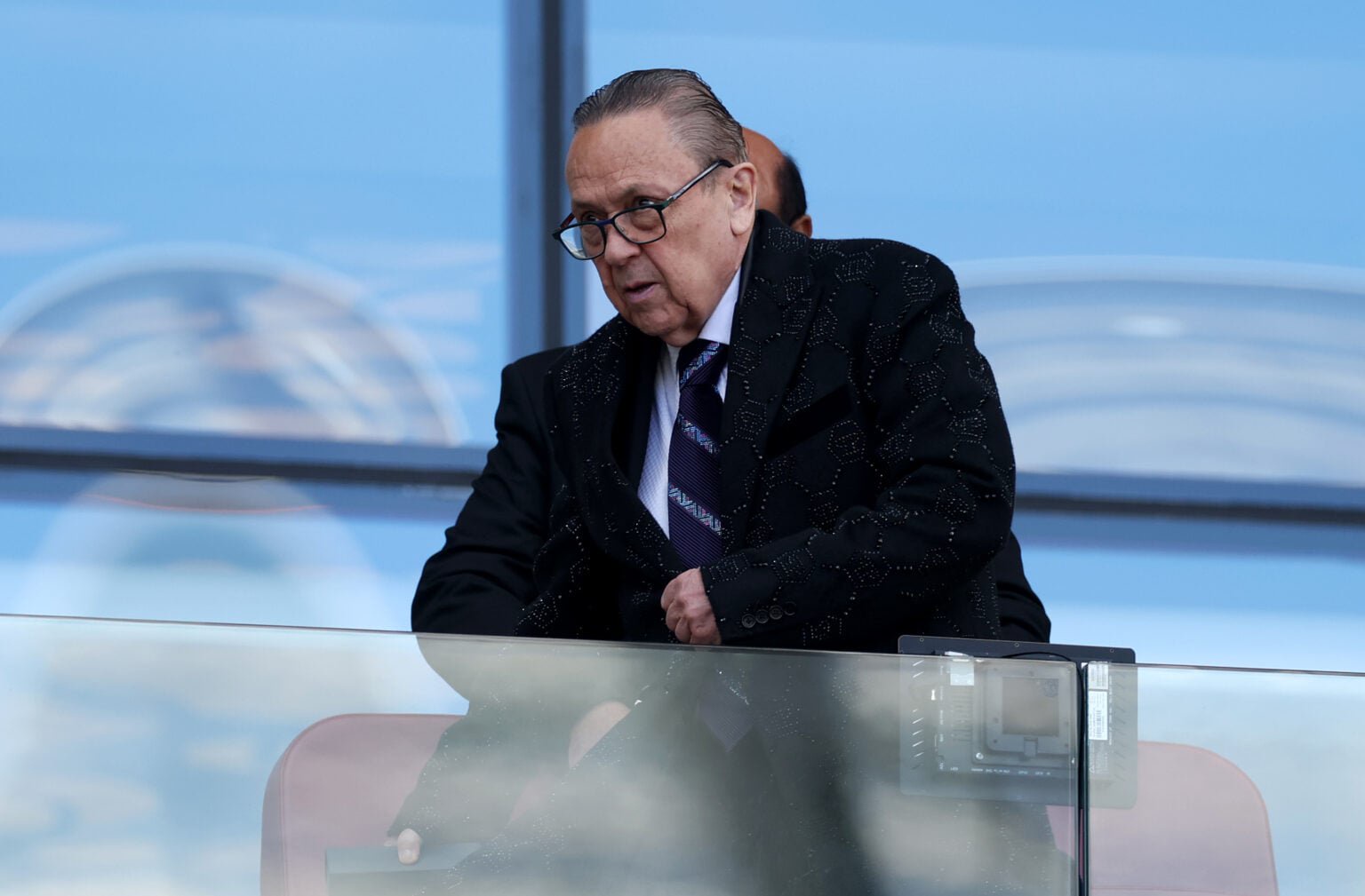 West Ham chief David Sullivan takes his seat in the director's box