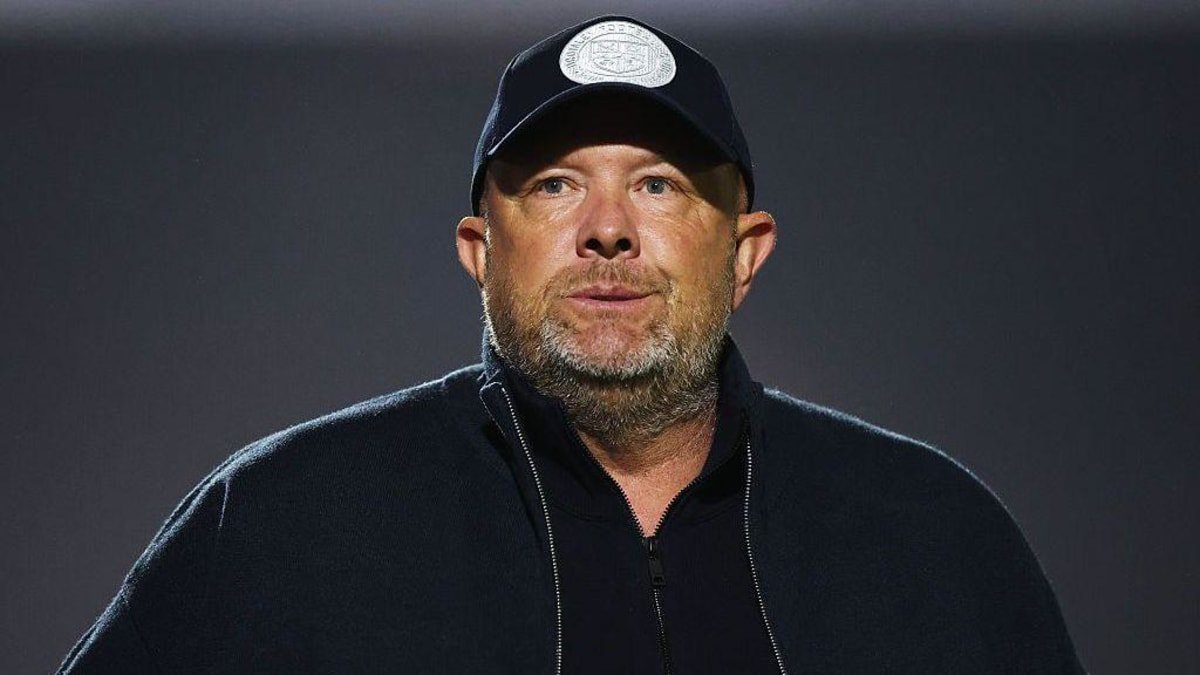 Andy Woodman, pictured in a black Bromley baseball cap