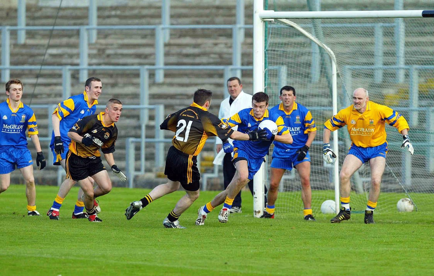 In action for St Brigid's in the 2004 Antrim JFC Final, from left: Paul O'Hara, Deaglan O'Hagan, James Loughrey, Eunan Conway (current chairman), and John Mackle.