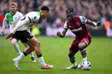 Mohammed Kudus of West Ham United takes on Trent Alexander-Arnold of Liverpool during the Premier League match between West Ham United and Liverpoo...