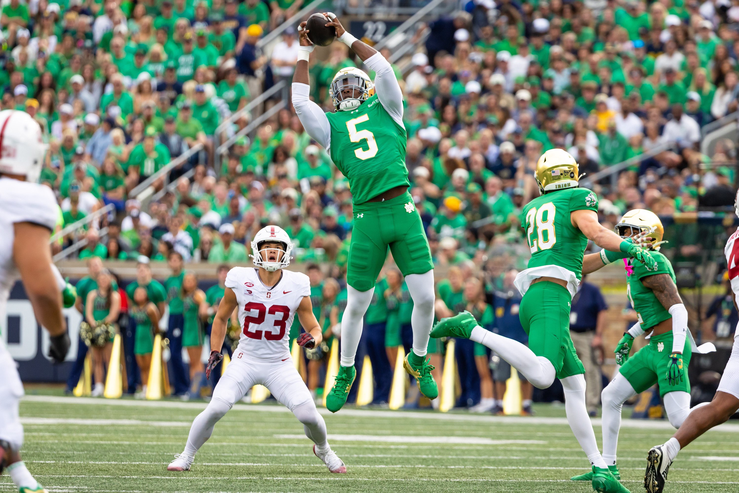 Oct 10, 2026; South Bend, Indiana, USA; Notre Dame Fighting Irish defensive lineman Boubacar Traore (5) intercepts a pass against the Stanford Cardinal during the first half at Notre Dame Stadium. Mandatory Credit: Michael Caterina-Imagn Images
