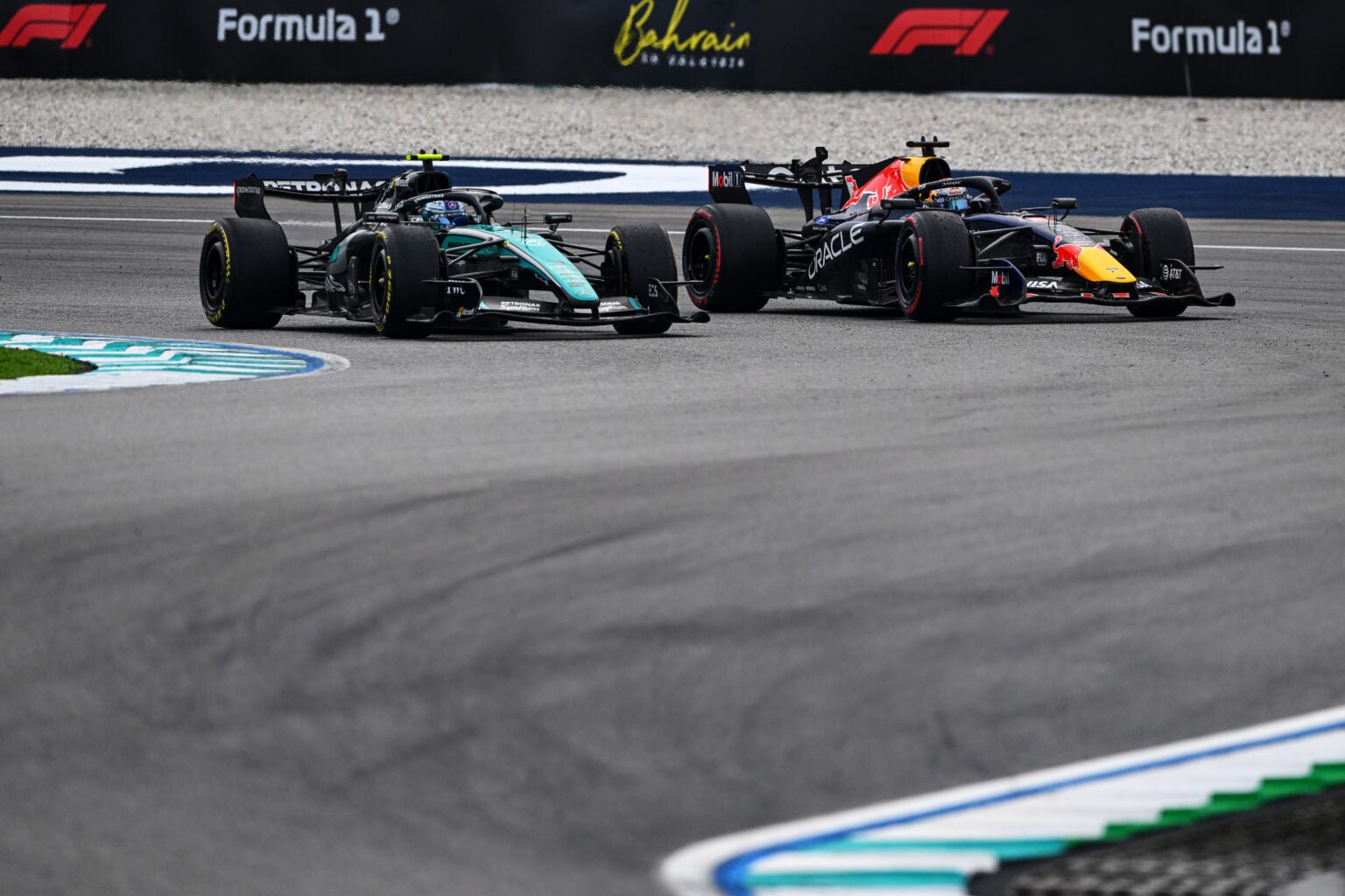 Mercedes driver Kimi Antonelli races with Red Bull driver Max Verstappen at the 2026 Bahrain Grand Prix in Malaysia