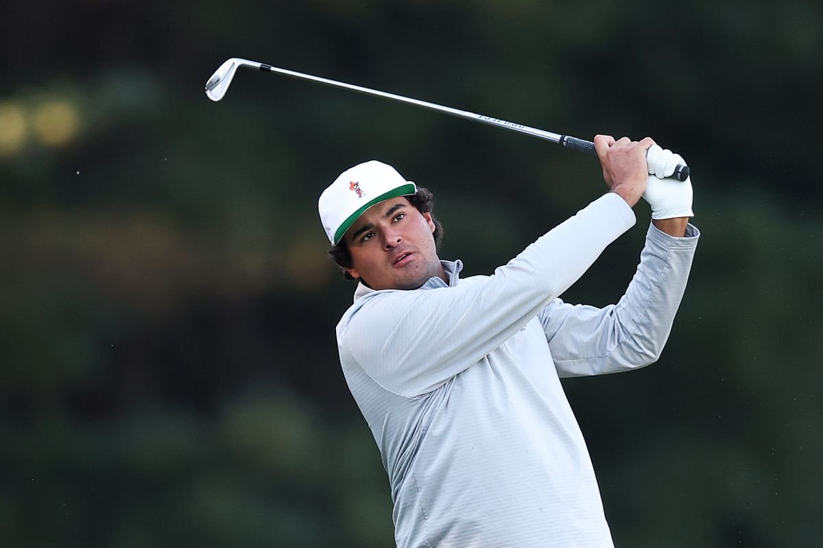 Eugenio Chacarra hits an iron shot