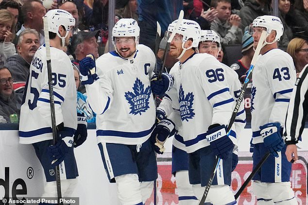 Toronto Maple Leafs center Auston Matthews (34) celebrates his goal in the second period of an NHL hockey game against the Columbus Blue Jackets in Columbus, Ohio, Tuesday, October. 20, 2026. (AP Photo/Sue Ogrocki)