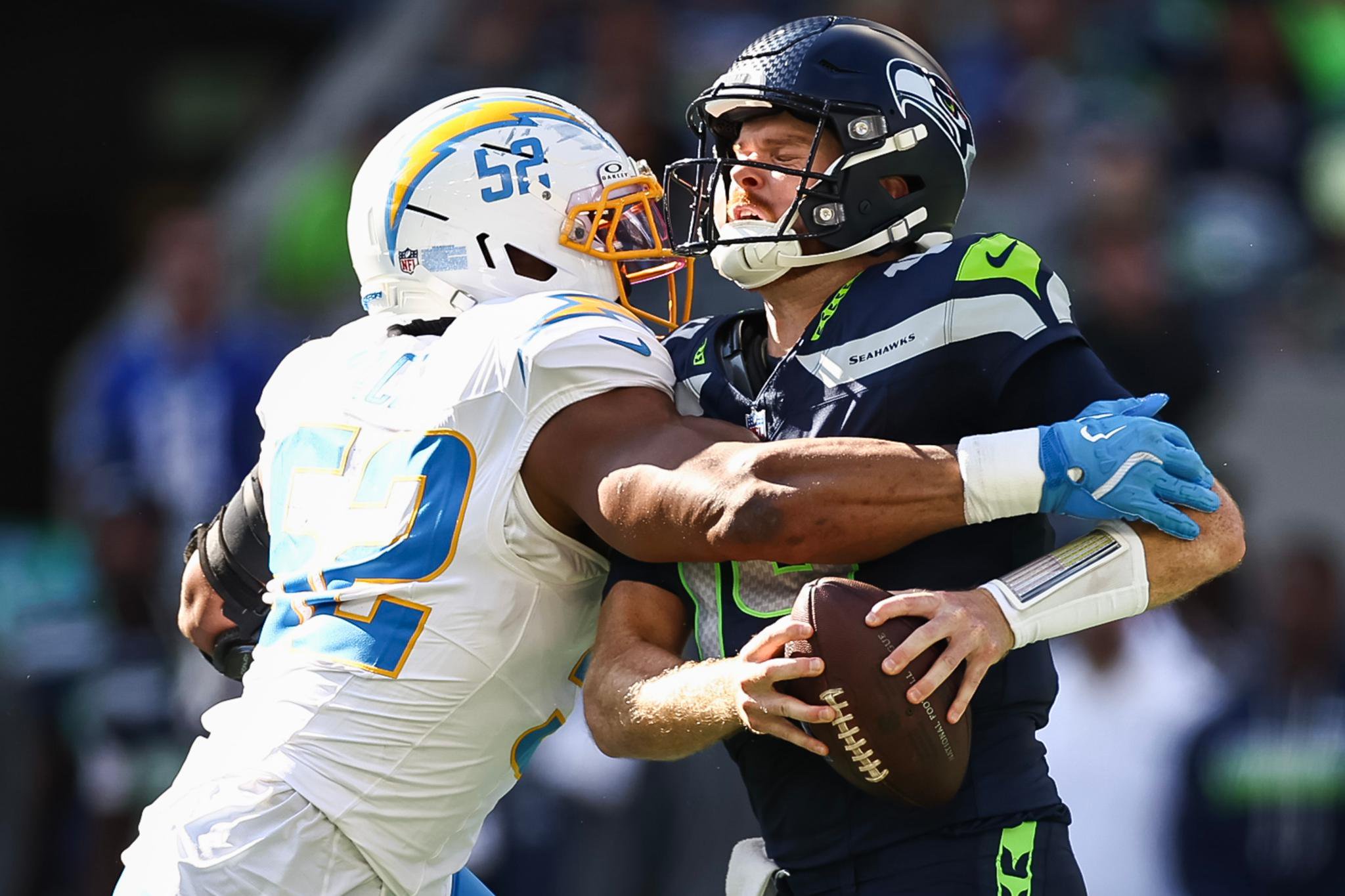 Los Angeles Chargers' Khalil Mack (52) sacks Seattle Seahawks' Sam Darnold (14).