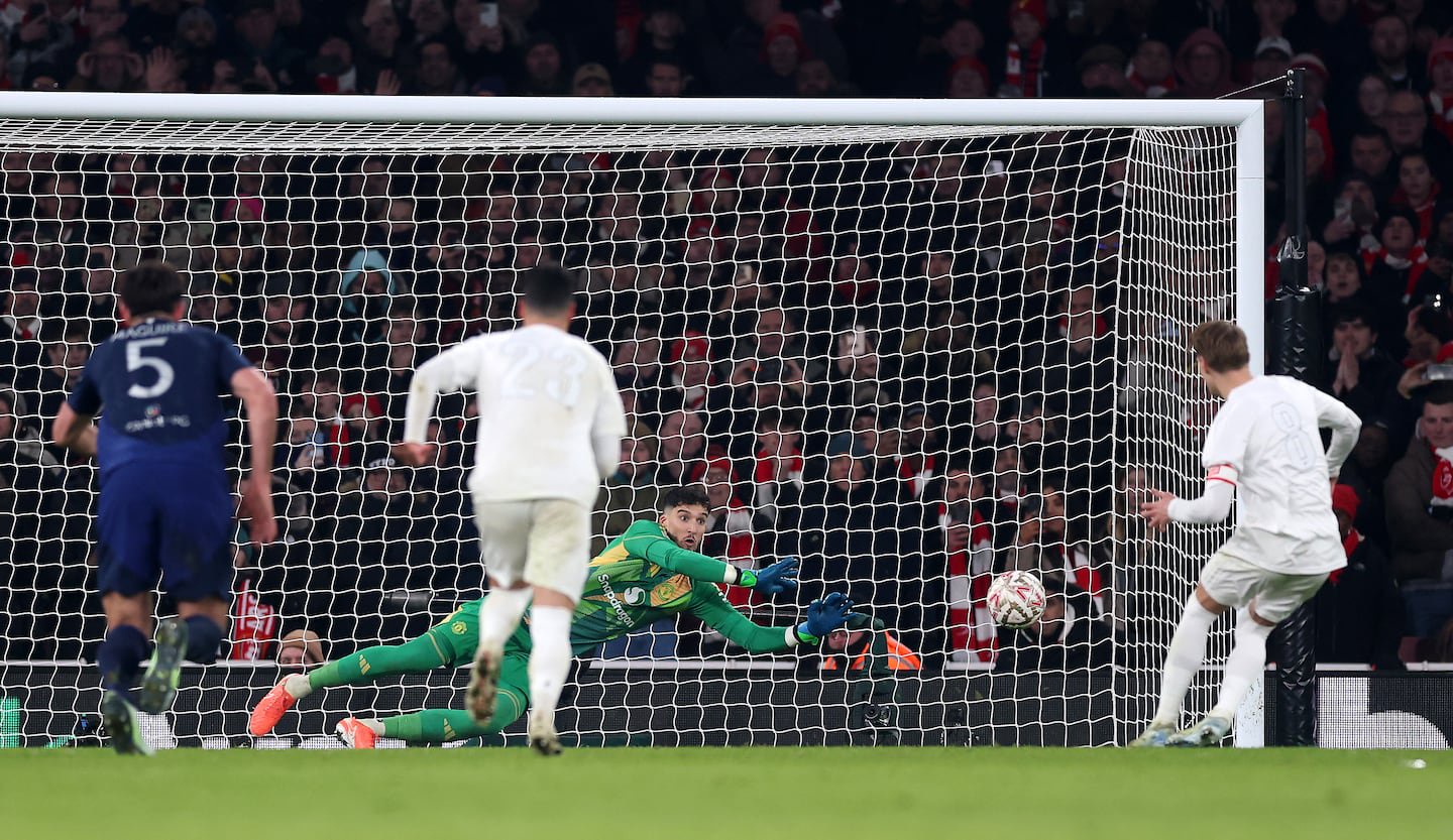 Manchester United's Altay Bayindir saves a penalty from Arsenal's Martin Odegaard during normal time of Sunday's FA Cup clash. Photo by Julian Finney/Getty Images