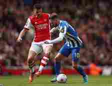 Brighton's Alexis Mac Allister in action with Arsenal's Granit Xhaka
