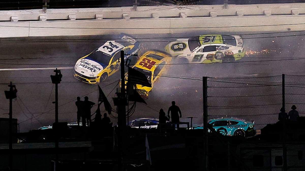 Michael McDowell, driver of the #34 Long John Silver's Ford, Joey Logano, driver of the #22 Shell Pennzoil Ford, and Justin Haley, driver of the #51 Beef a Roo Ford, spins after an on-track incident