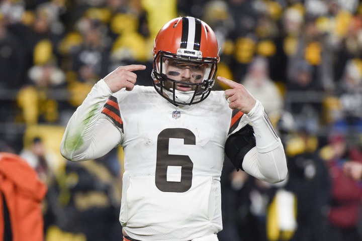 FILE - Cleveland Browns quarterback Baker Mayfield (6) gestures during the second half an NFL football game against the Pittsburgh Steelers, Monday, Jan. 3, 2022, in Pittsburgh. Baker Mayfield said the Cleveland Browns have work ahead if they want him to help them through their situation with Deshaun Watson. Mayfield, speaking at his football camp near the University of Oklahoma’s campus on Tuesday, June 28, didn’t entirely close the door on stepping in if needed.(AP Photo/Don Wright, File)