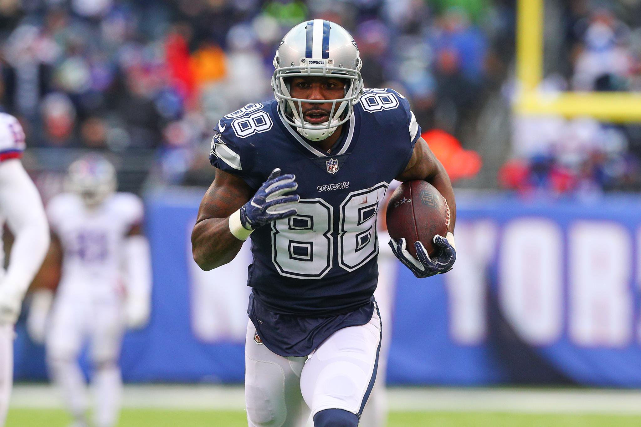 Dallas Cowboys wide receiver Dez Bryant runs with the football during a game against the New York Giants.