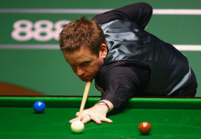 SHEFFIELD, UNITED KINGDOM - APRIL 28: Joe Swail of Northern Ireland plays a shot during his match against Liang Wenbo of China during day ten of the 888.com World Snooker Championships at the Crucible Theatre on April 28, 2008 in Sheffield, England. (Photo by Paul Gilham/Getty Images)