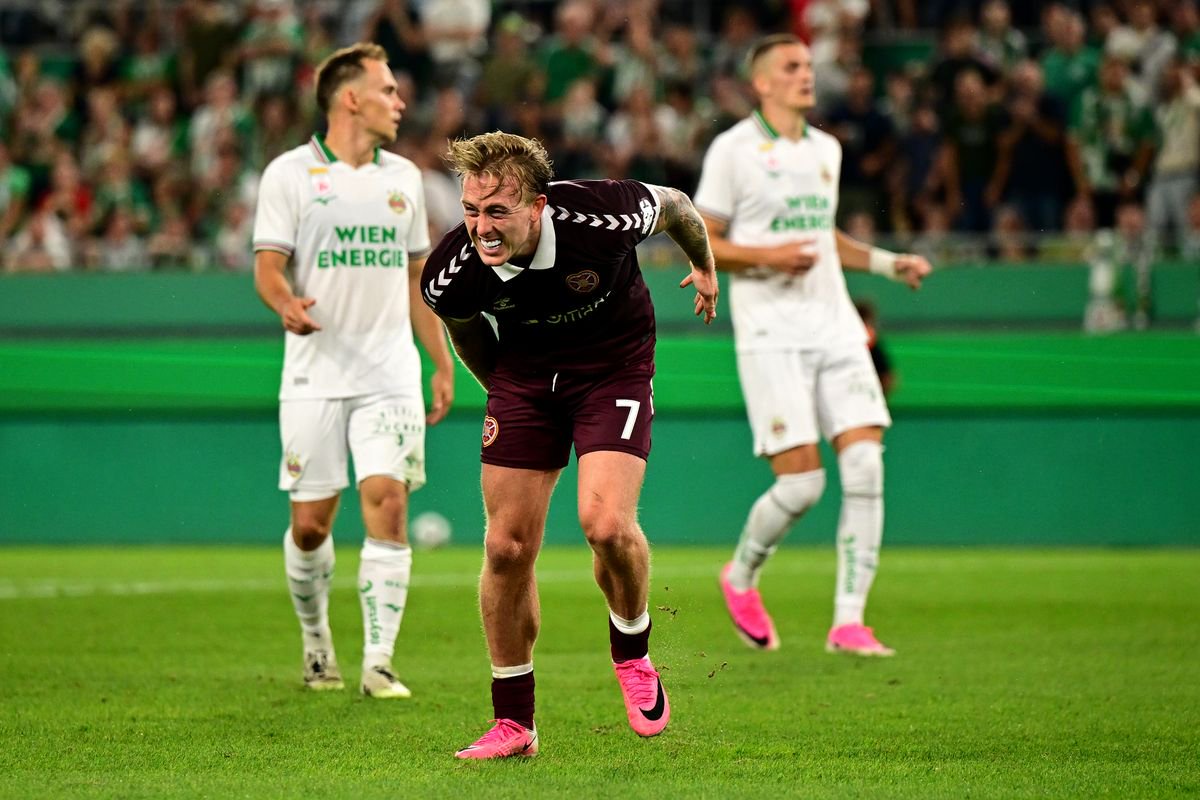 VIENNA, AUSTRIA - AUGUST 26: Calvin Miller of Heart of Midlothian celebrates scoring his team’s second goal with teammates during the UEFA Conference League 2026/27 Play Off Round Second Leg match between SK Rapid and Heart of Midlothian at Weststadion on August 26, 2026 in Vienna, Austria.  (Photo by Christian Bruna/Getty Images)