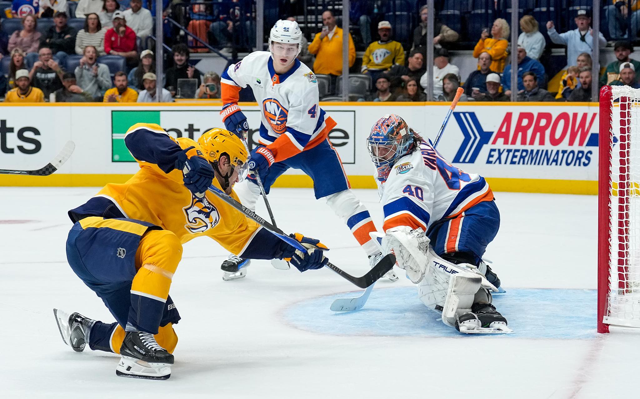 Semyon Varlamov makes a save on Nils Hoglander during the Islanders' 4-3 shootout win over the Predators on Oct. 27, 2026 in Nashville, Tenn.