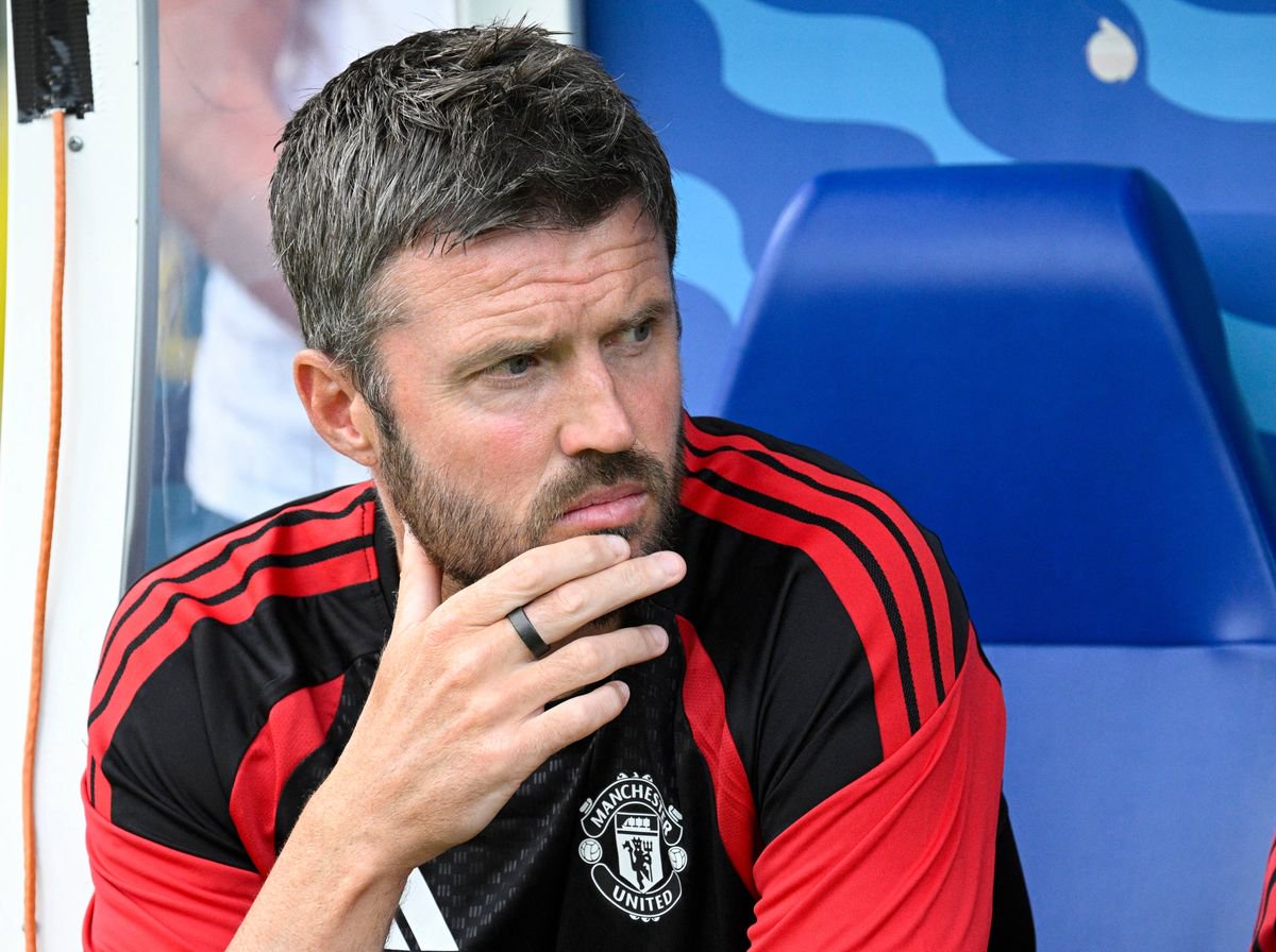Manchester United's English head coach Michael Carrick sits on the bench during the  pre-season friendly match between English Premier League football club Manchester United and EFL Championship club Wrexham AFC at Helsinki Olympic Stadium in Helsinki, Finland on July 18, 2026. (Photo by Markku Ulander / Lehtikuva / AFP via Getty Images) / Finland OUT