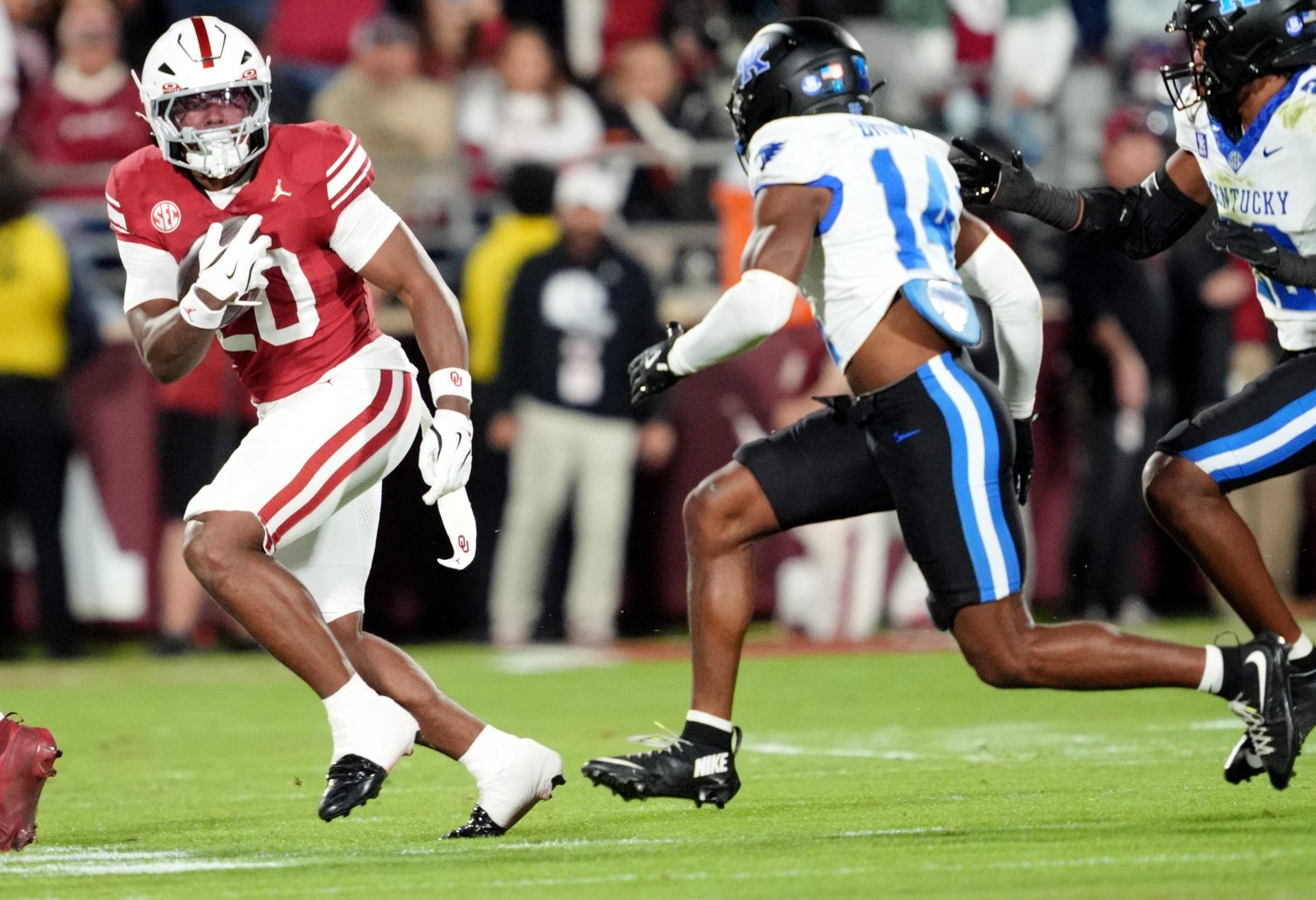 Oklahoma's Jonathan Hatton Jr. (20) looks to get by Kentucky's Ty Bryant (14) in the first half of the college football game between the University of Oklahoma Sooners (OU) and the Kentucky Wildcats at Gaylord Family — Oklahoma Memorial Stadium in Norman, Okla.,  Saturday, Oct., 17, 2026.