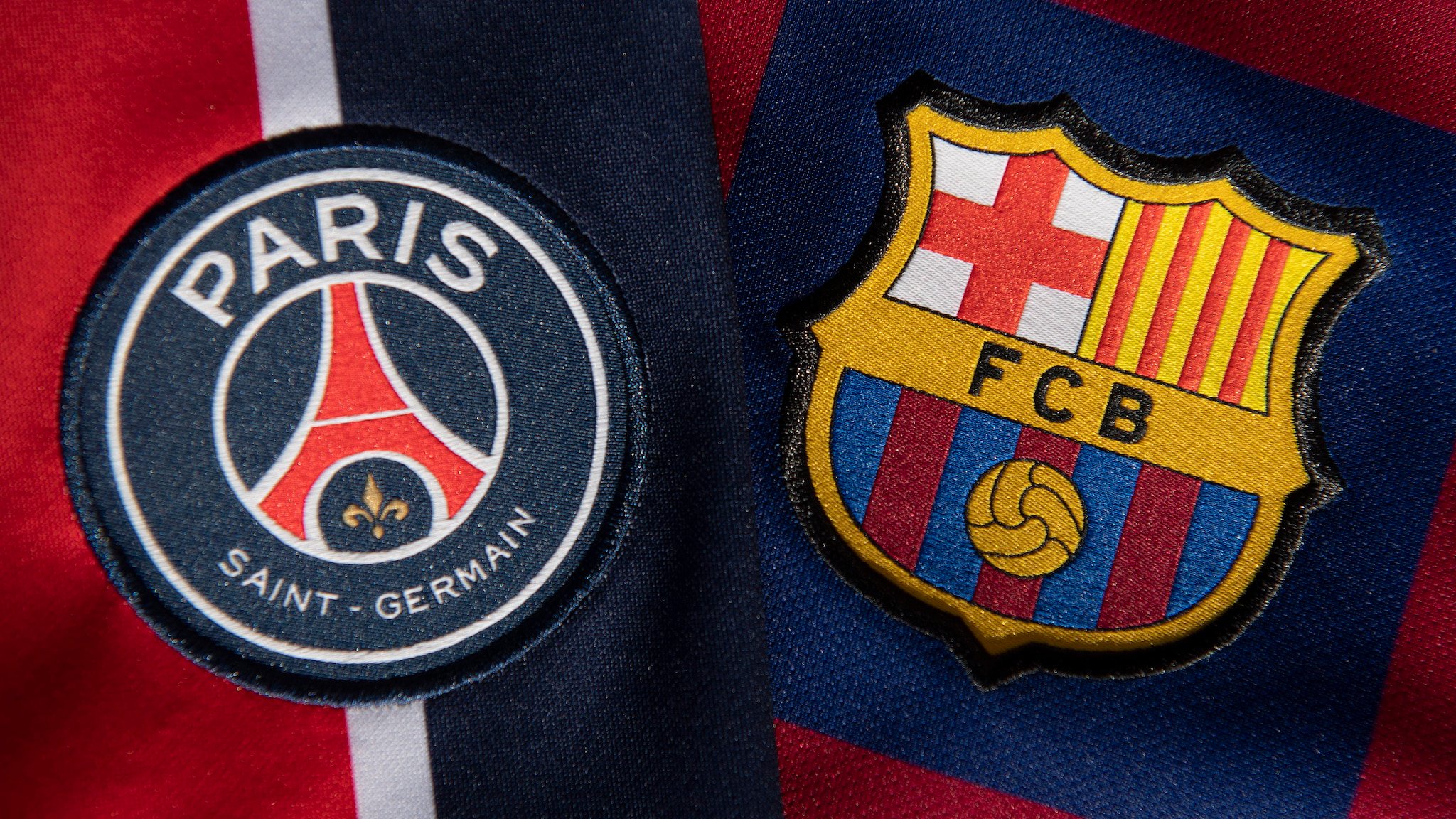 The paris saint germain and fc barcelona badges