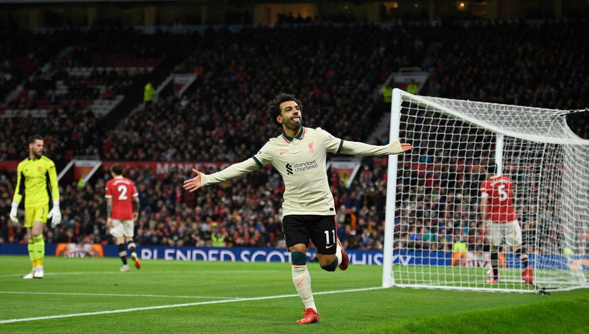 Mohamed Salah celebrates after scoring his hat-trick and Liverpool's fifth and final goal in their humbling of Manchester United 