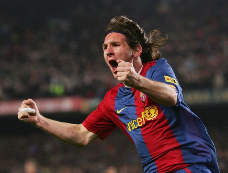BARCELONA, SPAIN - MARCH 10: Lionel Messi of Barcelona celebrates after scoring their second goal during the Primera Liga match between Barcelona and Real Madrid at the Nou Camp stadium on March 10, 2007 in Barcelona, Spain. (Photo by Denis Doyle/Getty Images)