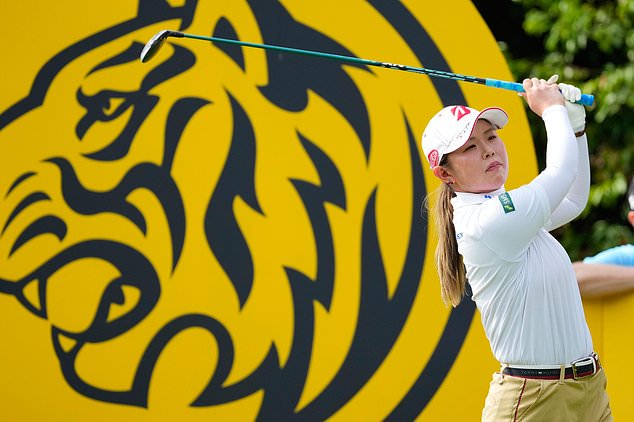 Yuri Yoshida of Japan tees off on the third tee during the first day of LPGA Maybank Championship in Kuala Lumpur, Malaysia, Thursday, Oct. 29, 2026. (AP Photo/Vincent Thian)