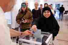 A woman votes in Strasbourg, eastern France, Sunday, June 30