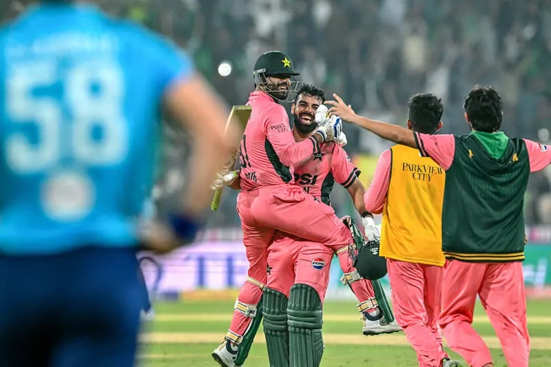 Shadab Khan and Haris Rauf embrace after a famous win for Pakistan