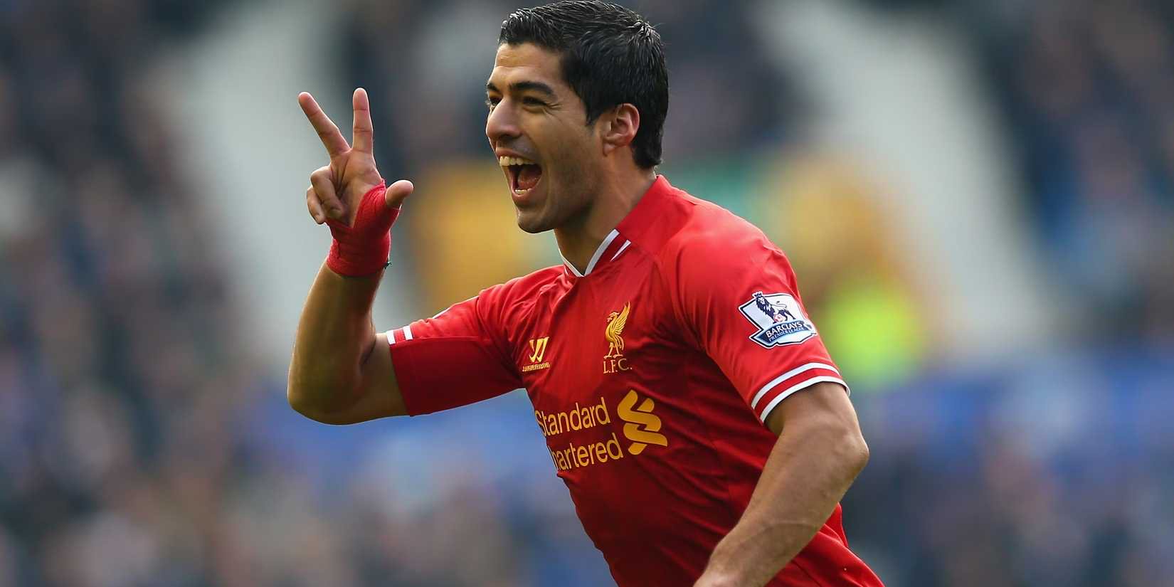 Luis Suarez celebrates