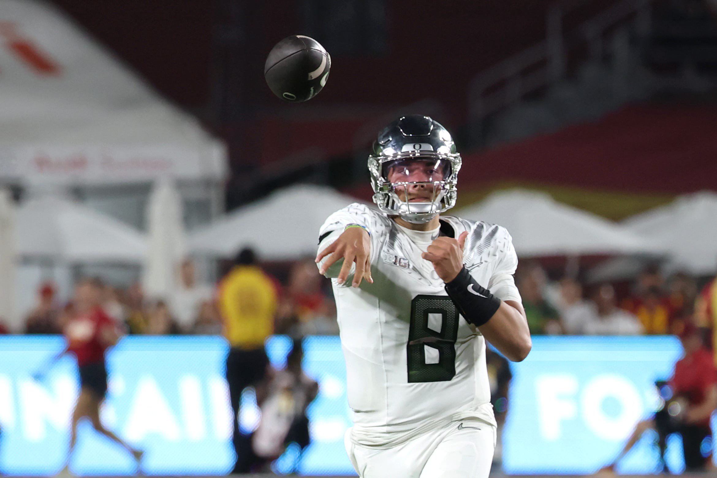 Sep 26, 2026; Los Angeles, California, USA;  Oregon Ducks quarterback Dylan Raiola (8) throws a pass against the USC Trojans during the second half at United Airlines Field at Los Angeles Memorial Coliseum.  Mandatory Credit: Kiyoshi Mio-Imagn Images