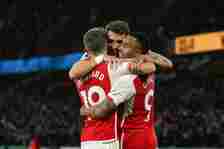 Leandro Trossard of Arsenal (L), along with Jakub Kiwior and Gabriel Jesus, is celebrating after scoring his team's first goal during the Premier L...