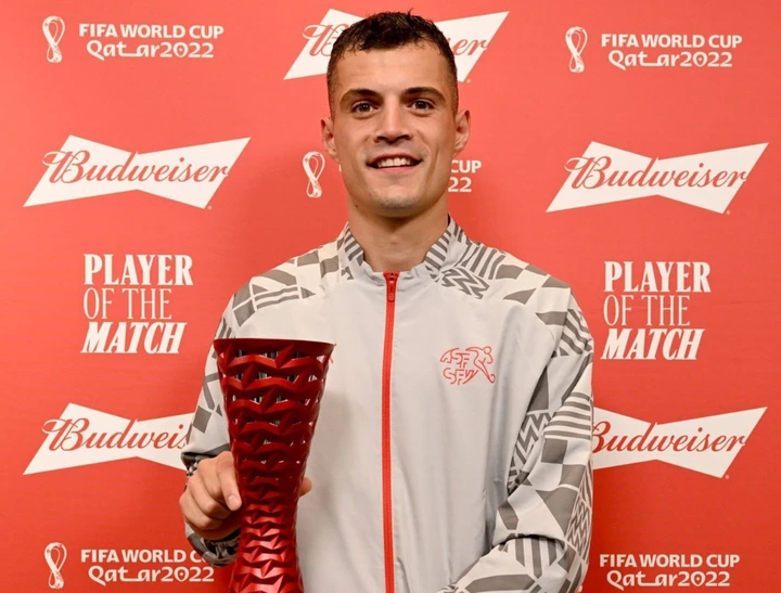 Arsenal star Granit Xhaka pose with Man of match award after stunning display for Switzerland against Serbia 