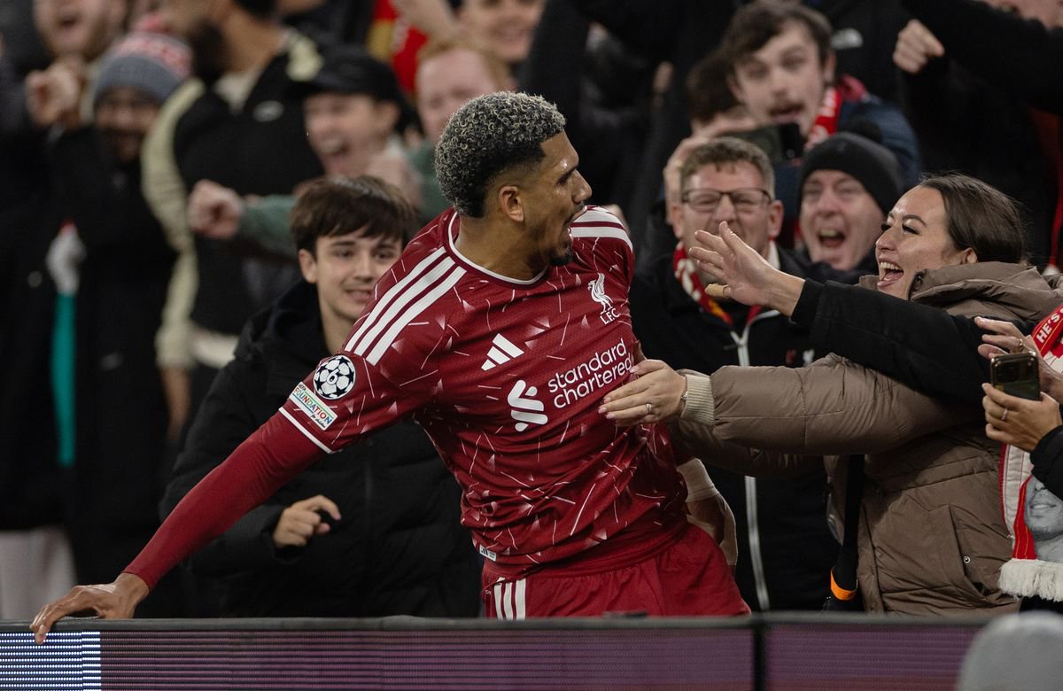 Liverpool center-back Ronald Araujo celebrates with the Anfield crowd.