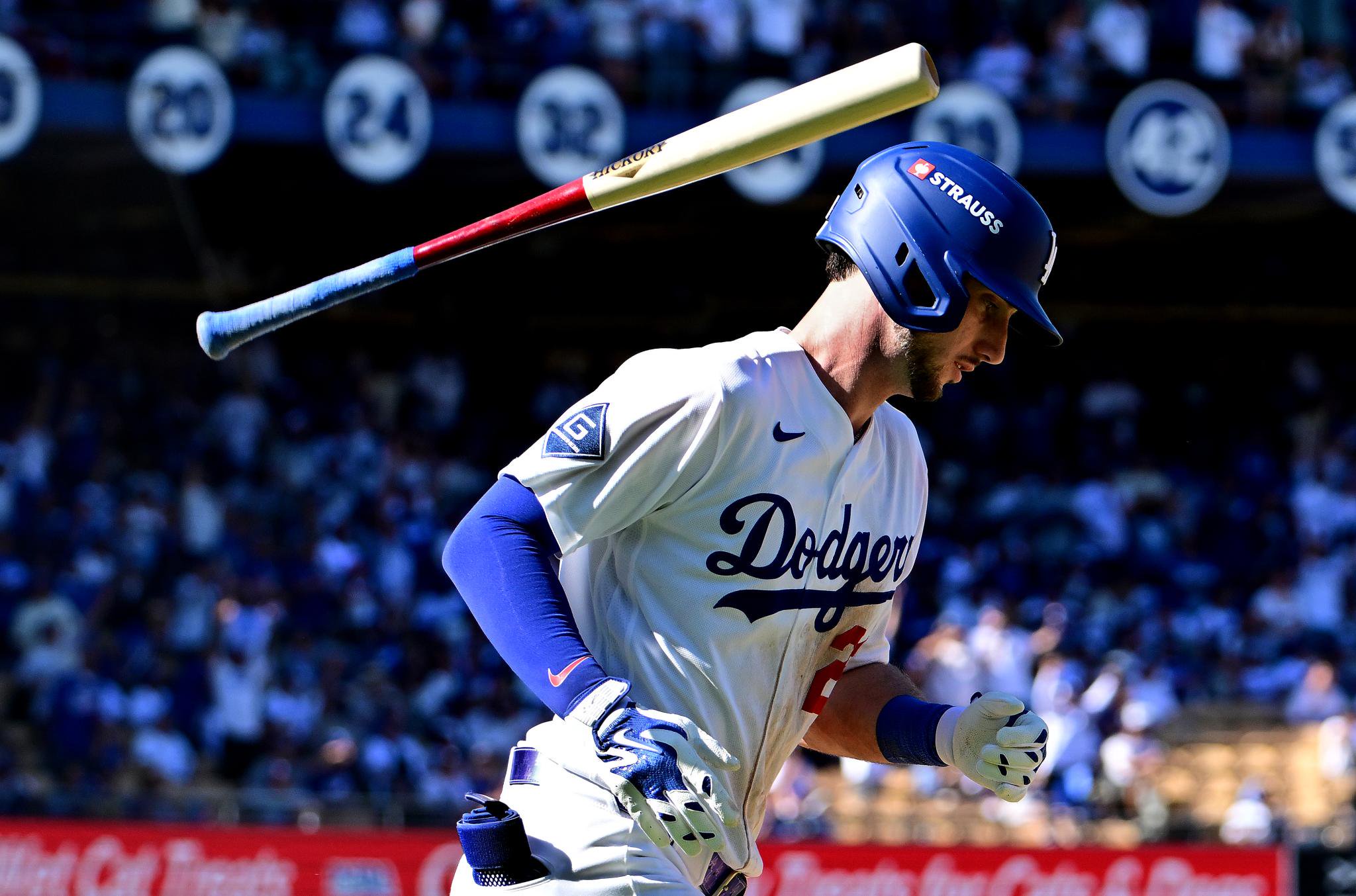 Los Angeles Dodgers' Kyle Tucker flips his bat after hitting a home run.