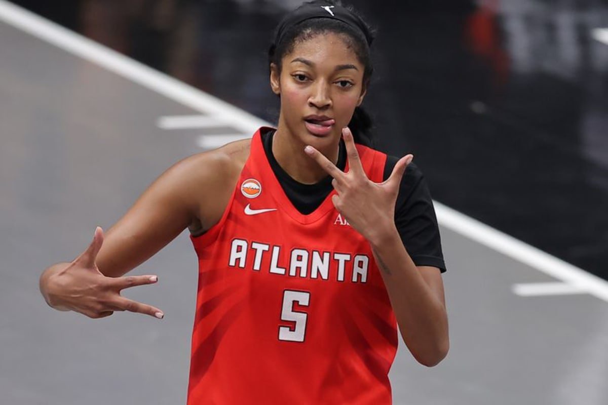 Angel Reese reacts after a bucket