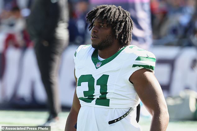 New York Jets edge David Bailey (31) stands on the field before an NFL football game against the New England Patriots in Foxborough, Mass., Sunday, Oct. 18, 2026. (AP Photo/Mark Stockwell)