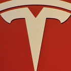 Tesla lays off hundreds of employees on electric vehicle charger team