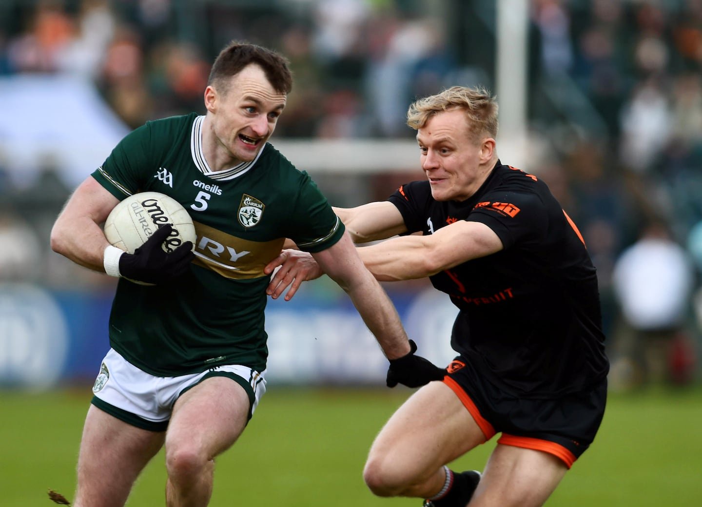 Cian McConville attempts to curb the attacking threat of Tom O'Sullivan at the Athletic Grounds on Sunday. PICTURE: JOHN MERRY