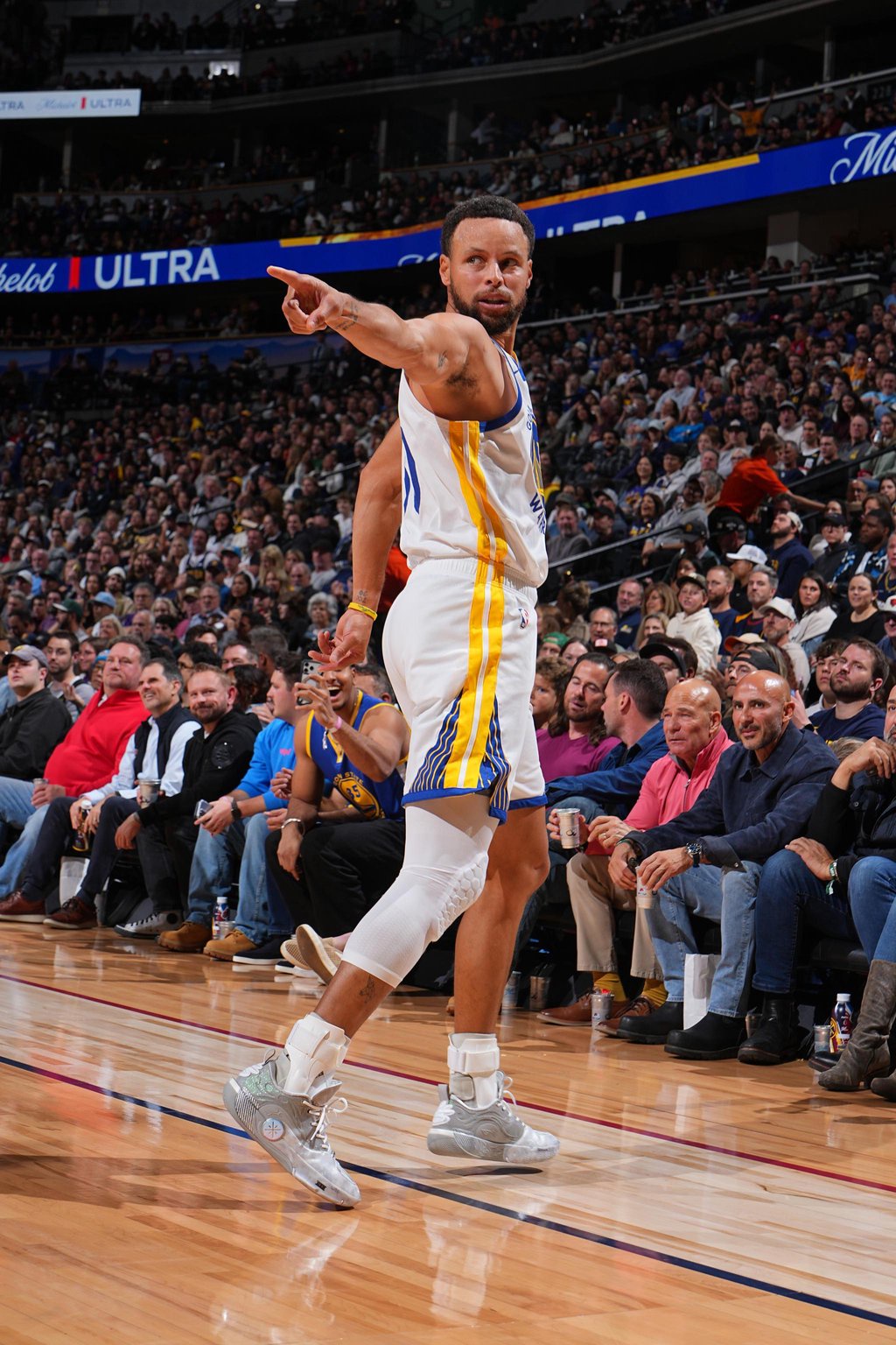Stephen Curry of the Golden State Warriors points during a game against the Denver Nuggets.