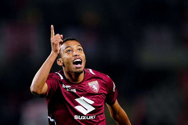 Torino's Rafik Belghali celebrates after scoring during the Serie A soccer match between Torino FC and AC Monza in Turin, Italy, Friday Oct. 23, 2026. (Fabio Ferrari/LaPresse via AP)