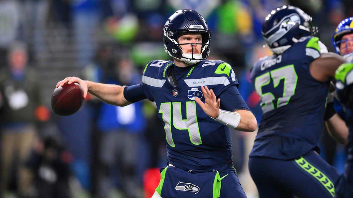 Sam Darnold looks to pass