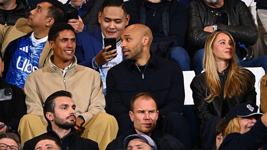 Former France internationals Raphael Varane (left) and Thierry Henry (centre)