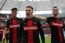 Florian Wirtz of Bayer 04 Leverkusen celebrates after scoring his team's third goal with teammates during the Bundesliga match between Bayer 04 Lev...